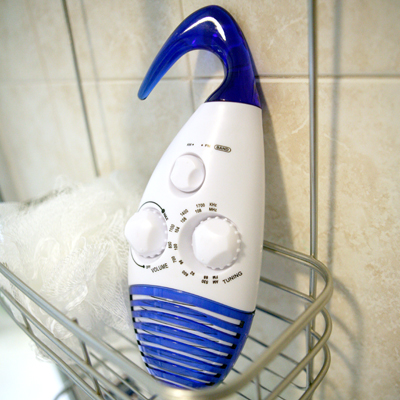 SUNTONE® Shower Radio - Water-resistant AM/FM shower radio.  Features an easy-to-use rotating hook for handy hanging in the bathroom/shower.  Battery powered.